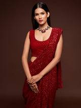 Luxurious ruby red embellished festive saree