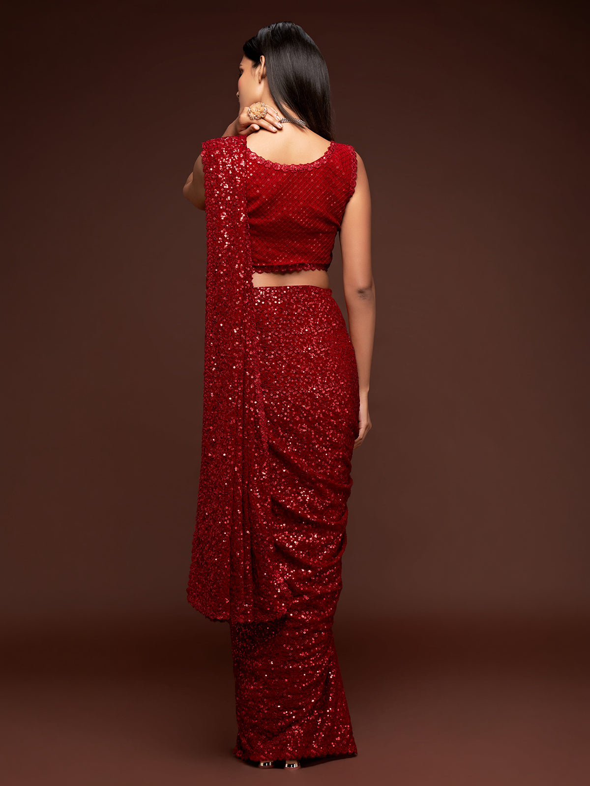 Luxurious ruby red embellished festive saree