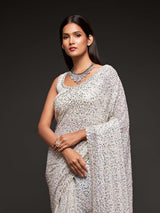 Royal pearl white reception georgette saree