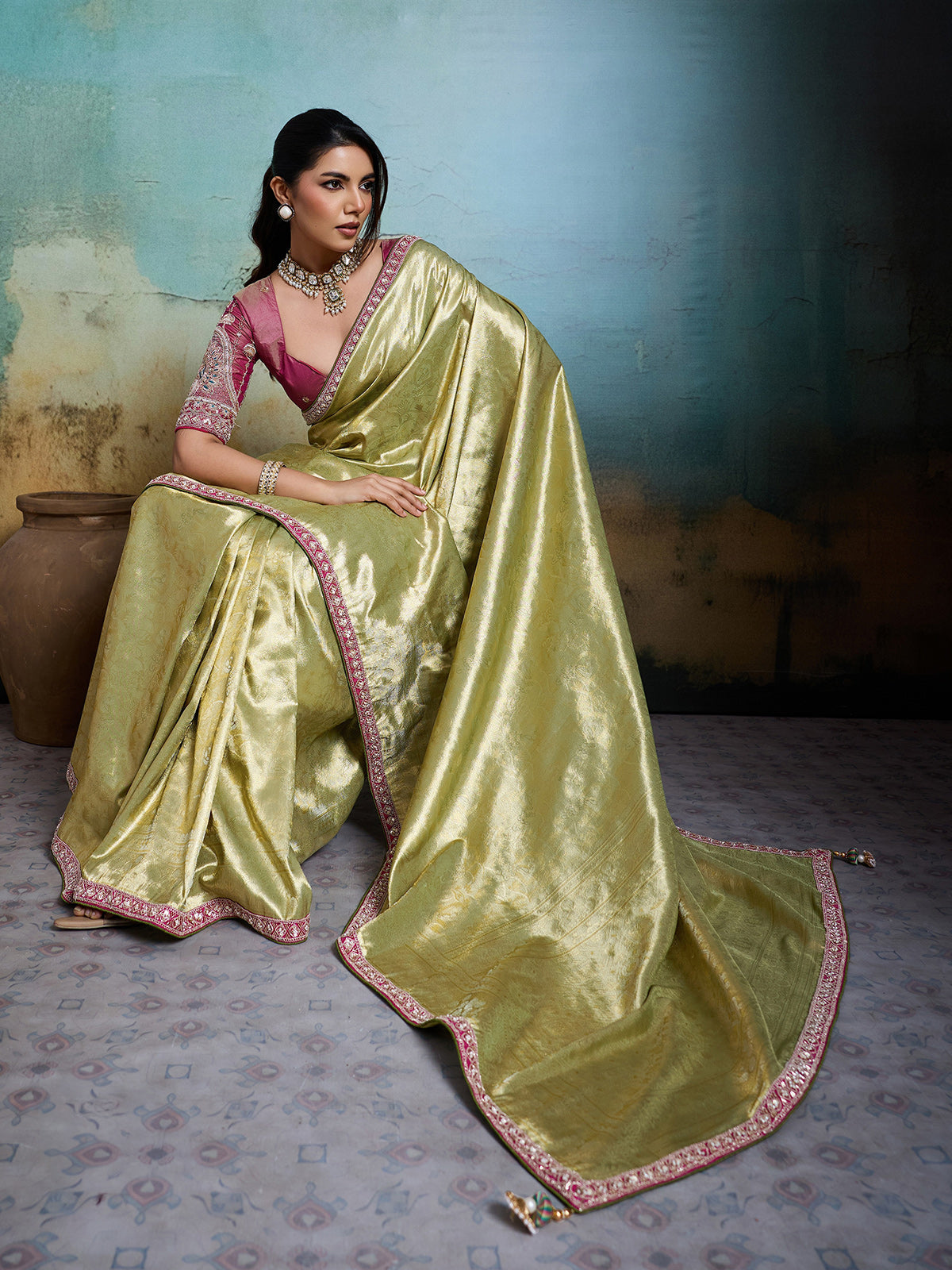 Elegant green metallic tissue silk saree
