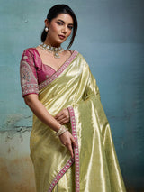Elegant green metallic tissue silk saree