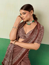 Sophisticated brown ajrakh partywear saree