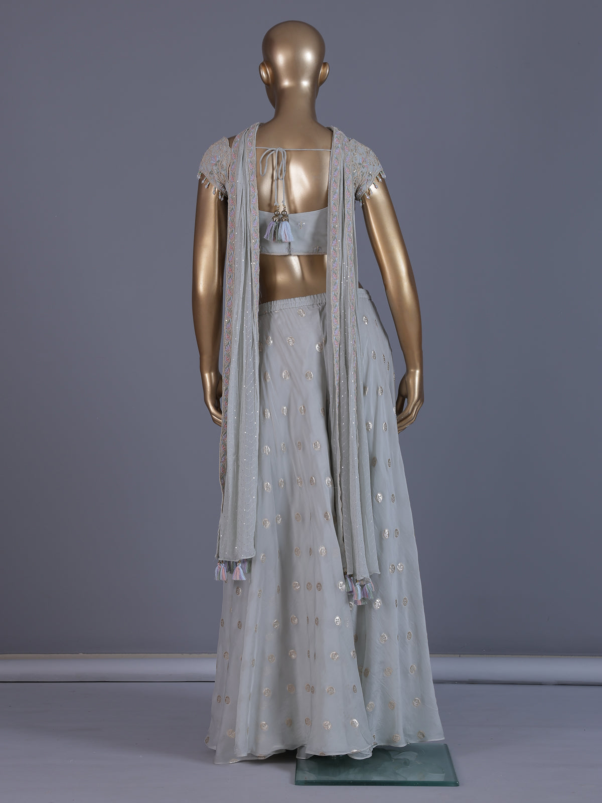 Off white tissue georgette palazzo suit with tassels