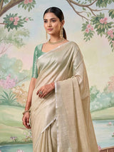 Champagne beige tissue silk woven saree