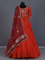 Rust orange printed silk wedding lehenga choli