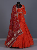 Rust orange printed silk wedding lehenga choli