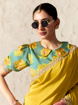 Radiant yellow embellished organza saree