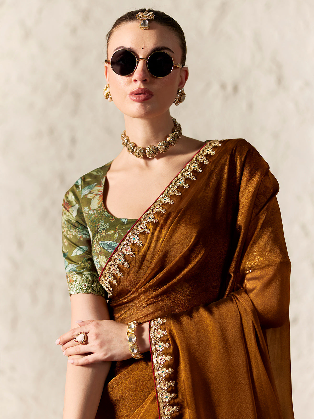 Grand brown artistic festive saree