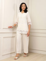 White schiffli embroidered contemporary fashion favorite