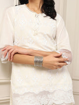 White schiffli embroidered contemporary fashion favorite