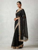 Black embellished semi soft tissue reception saree