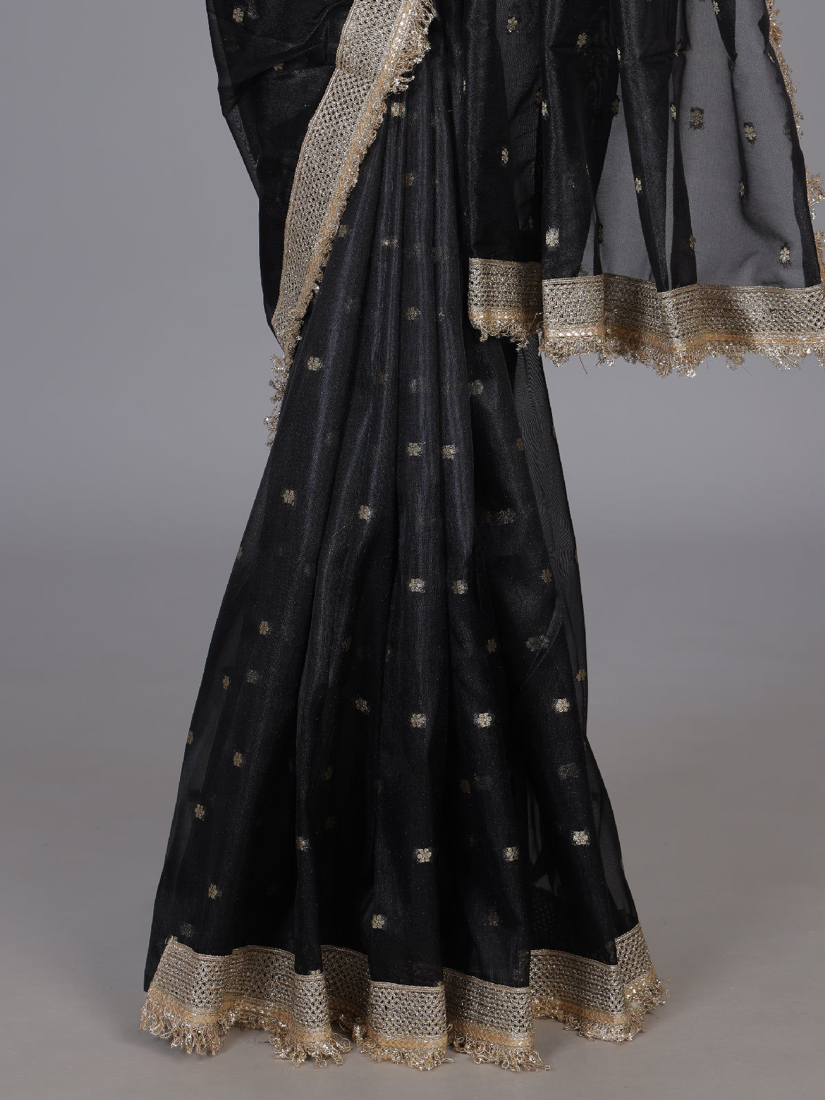 Black embellished semi soft tissue reception saree