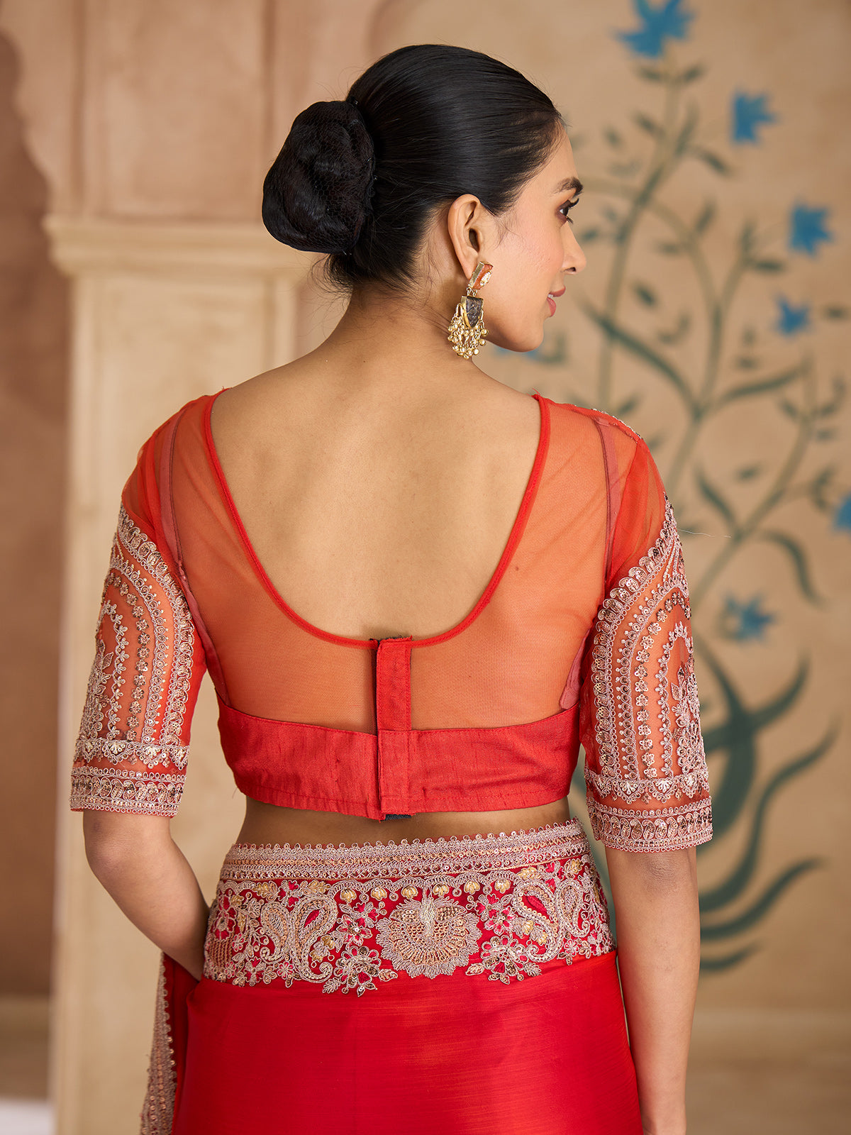 Orange radiant embroidered satin chiffon saree elegance