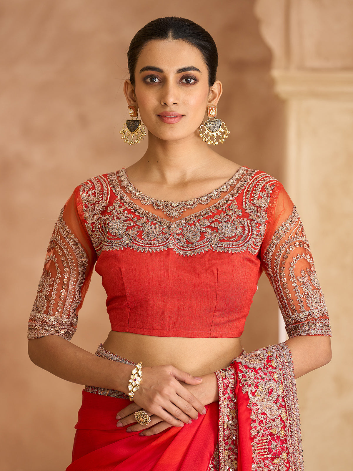 Orange radiant embroidered satin chiffon saree elegance