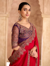 Cherry red luxurious zari wedding saree statement
