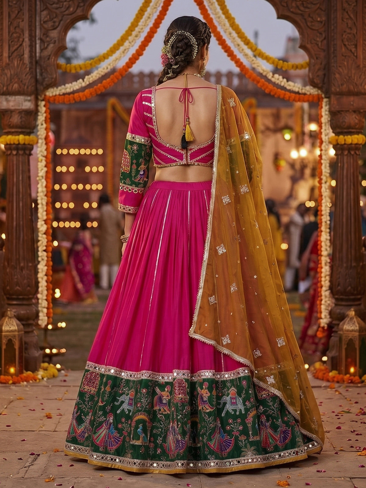 Rani pink mirror adorned festive lehenga grandeur