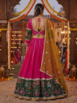 Rani pink mirror adorned festive lehenga grandeur