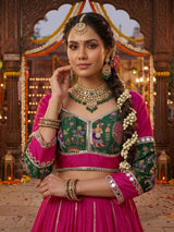 Rani pink mirror adorned festive lehenga grandeur