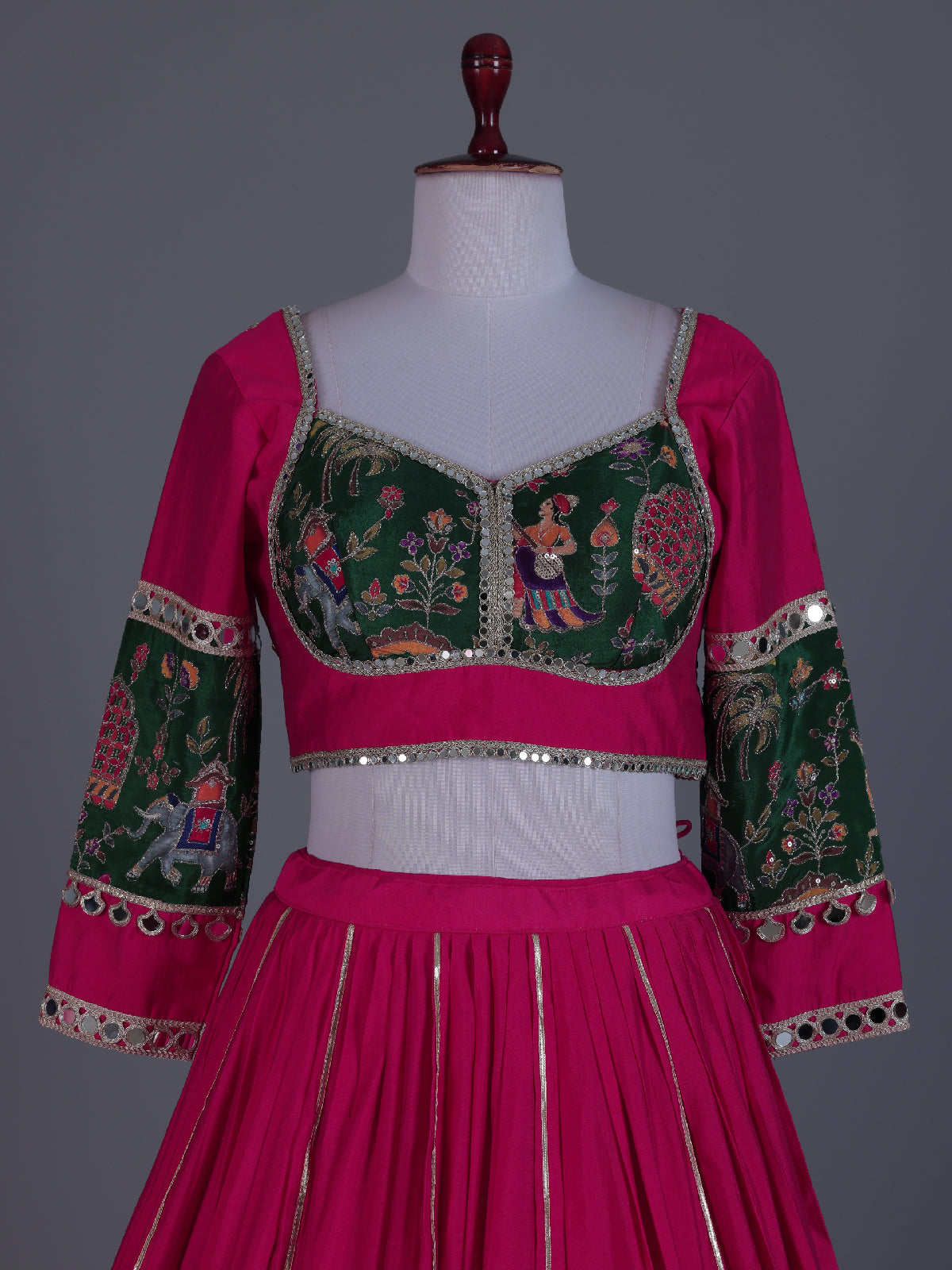 Rani pink mirror adorned festive lehenga grandeur