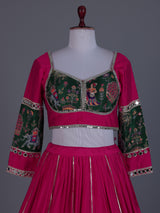 Rani pink mirror adorned festive lehenga grandeur