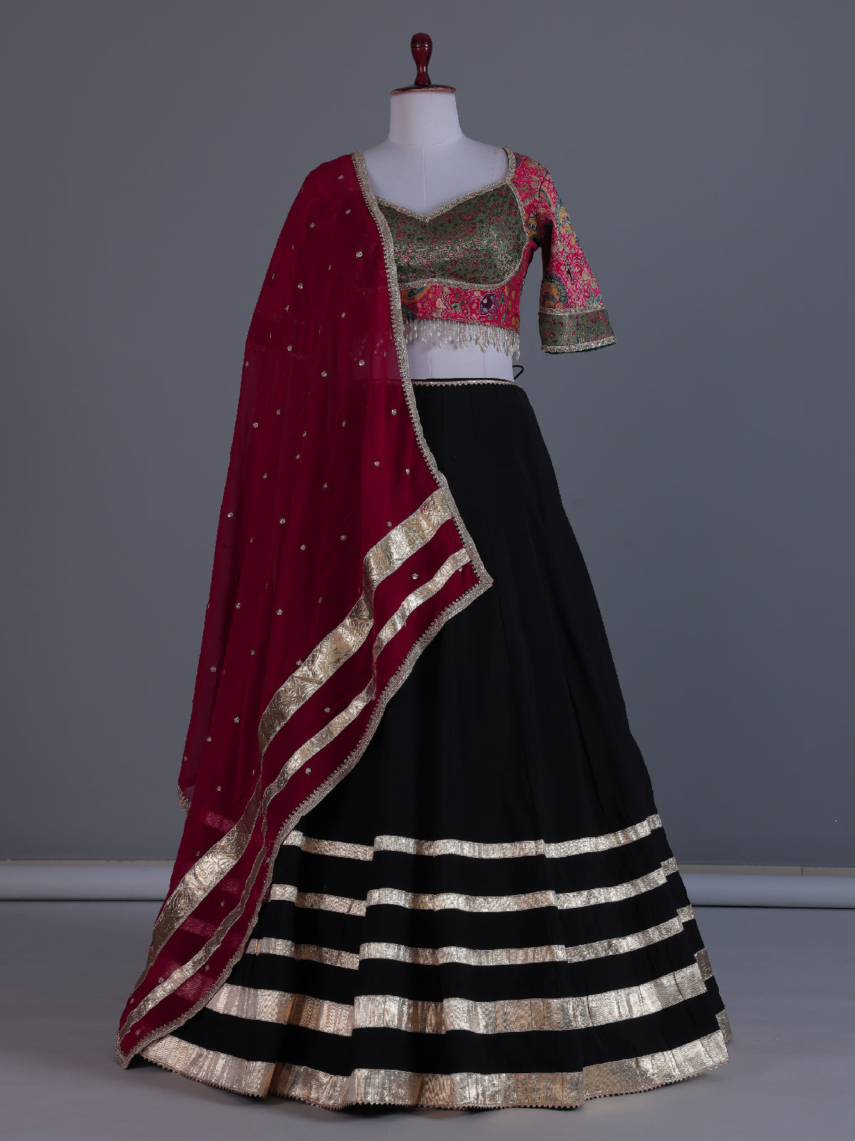 Black pichwai artistry festive lehenga statement attire