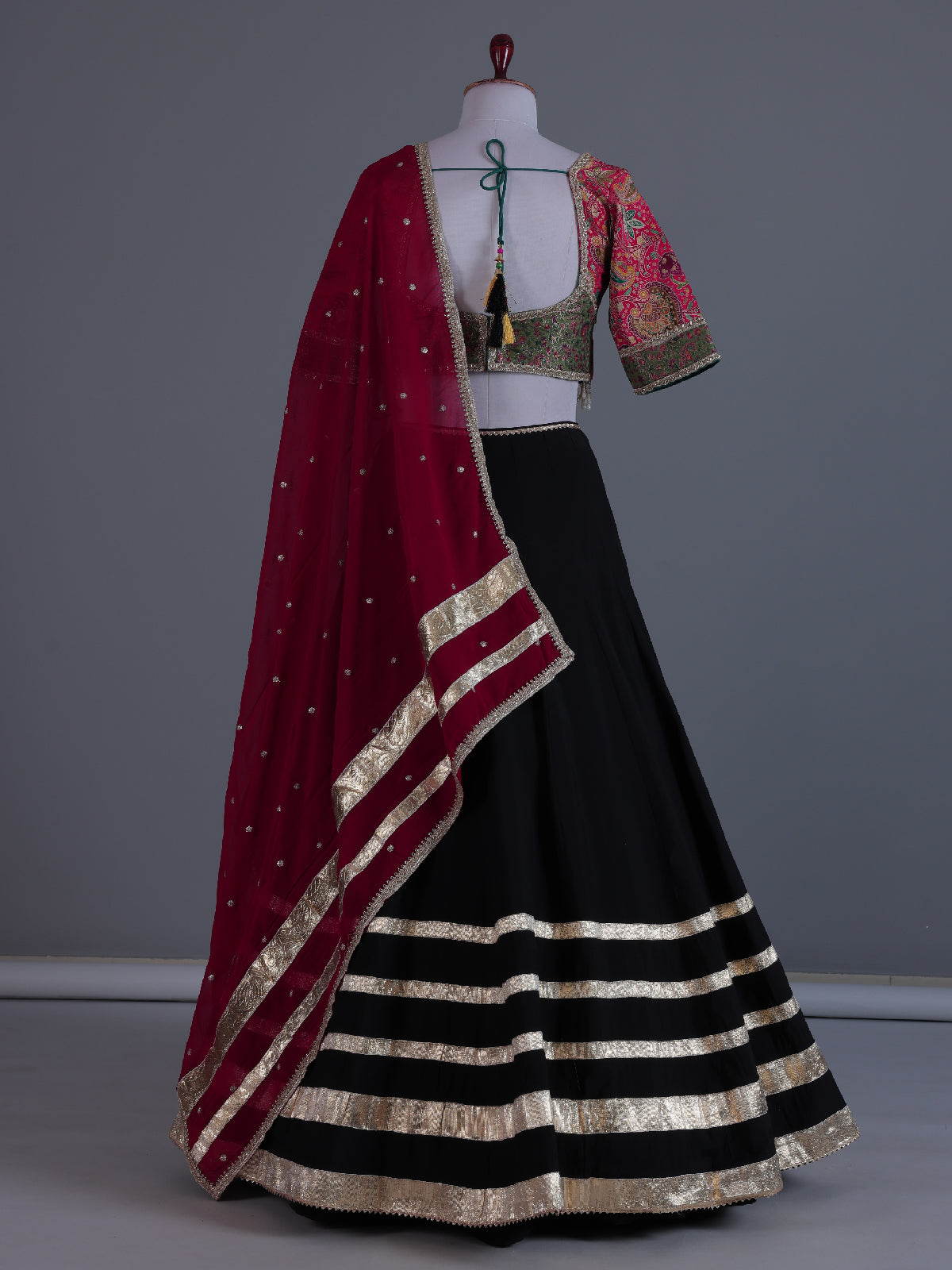 Black pichwai artistry festive lehenga statement attire