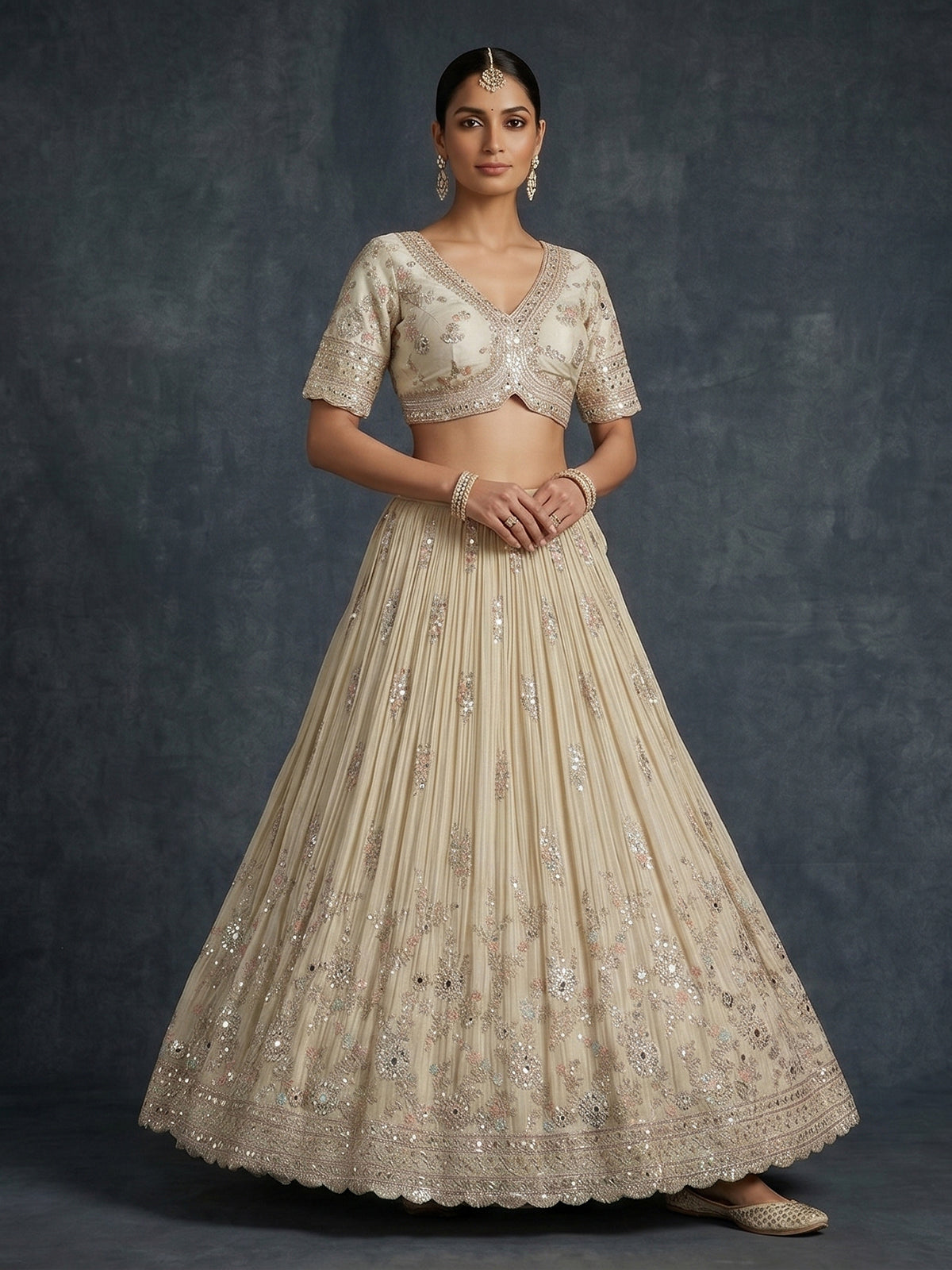 Cream scalloped masterpiece lehenga with royal elegance