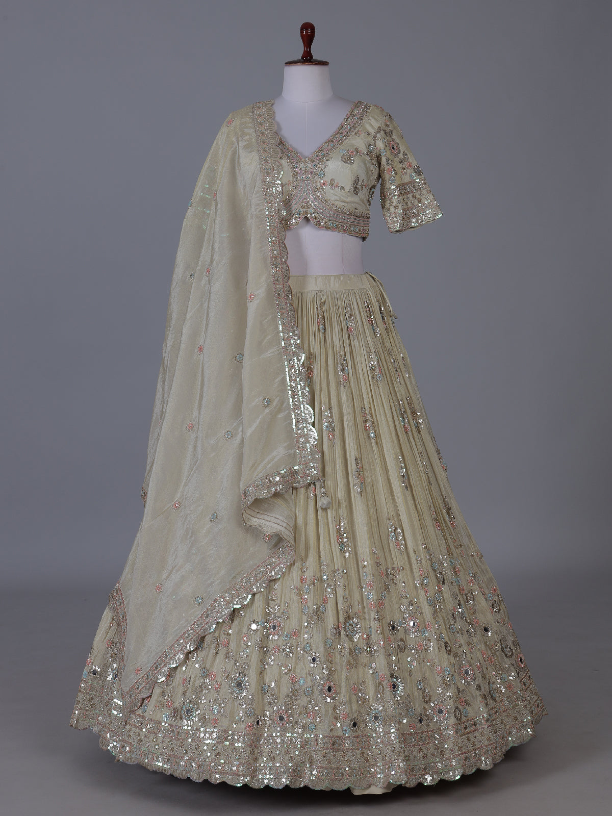 Cream scalloped masterpiece lehenga with royal elegance