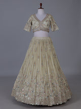 Cream scalloped masterpiece lehenga with royal elegance
