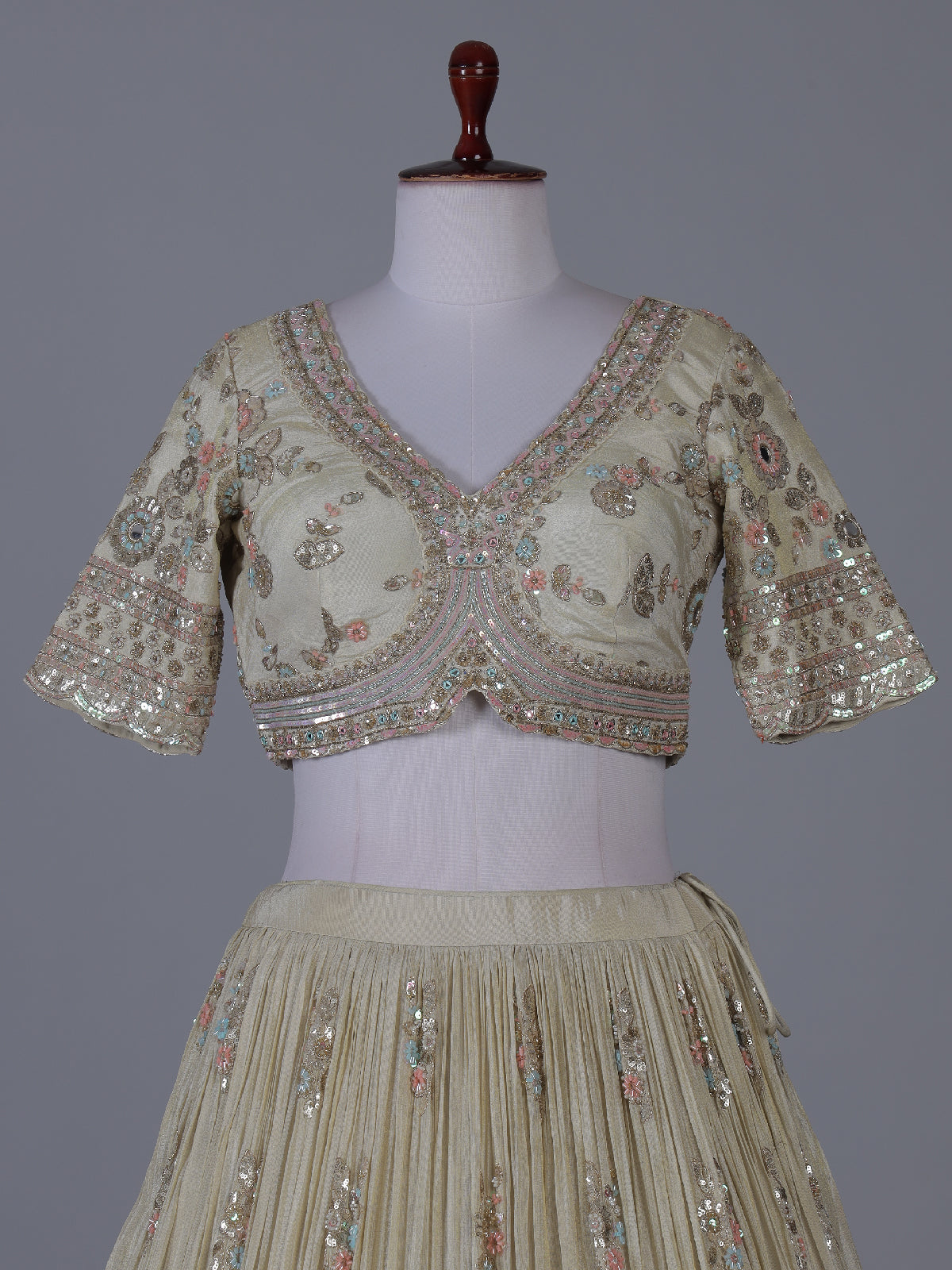 Cream scalloped masterpiece lehenga with royal elegance