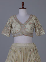 Cream scalloped masterpiece lehenga with royal elegance