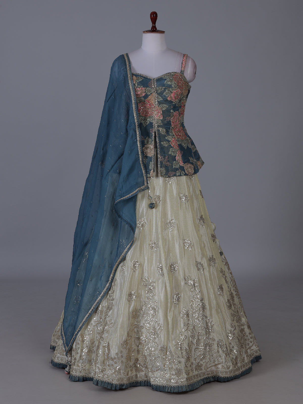 Cream teal blossom peplum lehenga wedding splendor