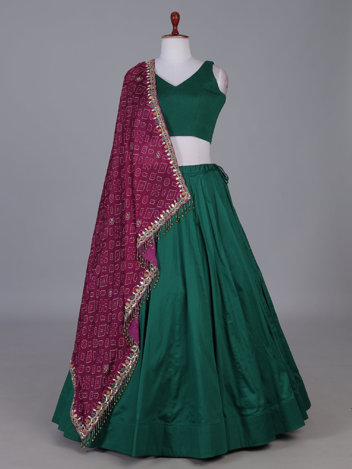 Green bandhani grace lehenga with mirror elegance