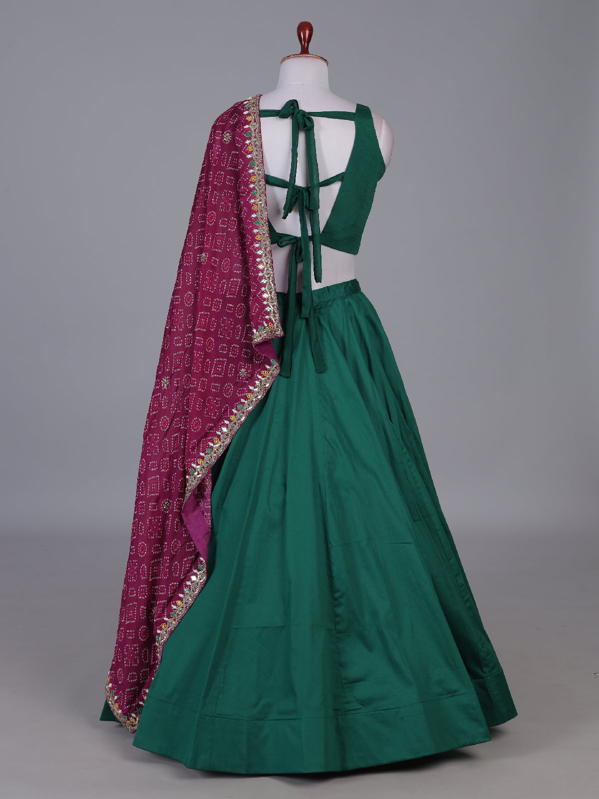 Green bandhani grace lehenga with mirror elegance