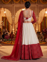 Red bandhani heritage lehenga with festive flair