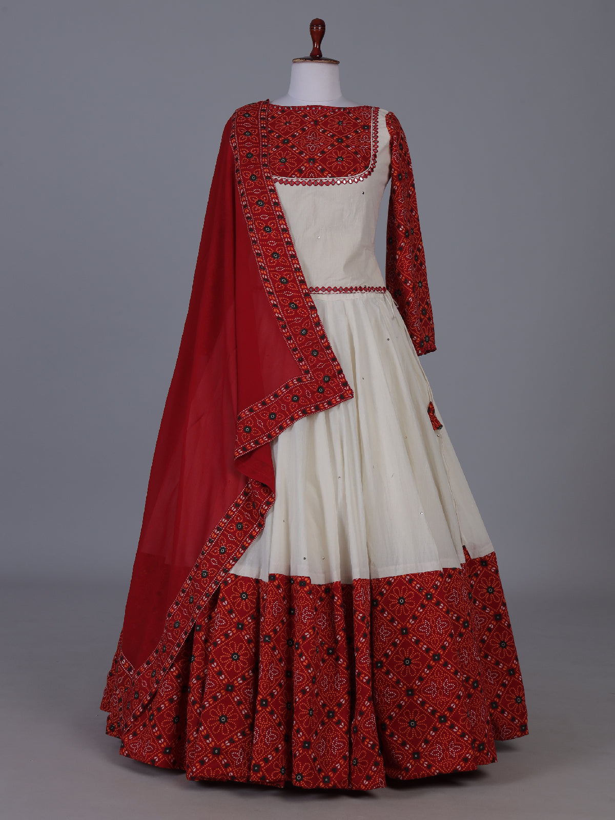 Red bandhani heritage lehenga with festive flair