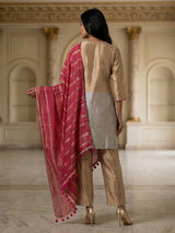 Gold and beige silk salwar suit with embroidery