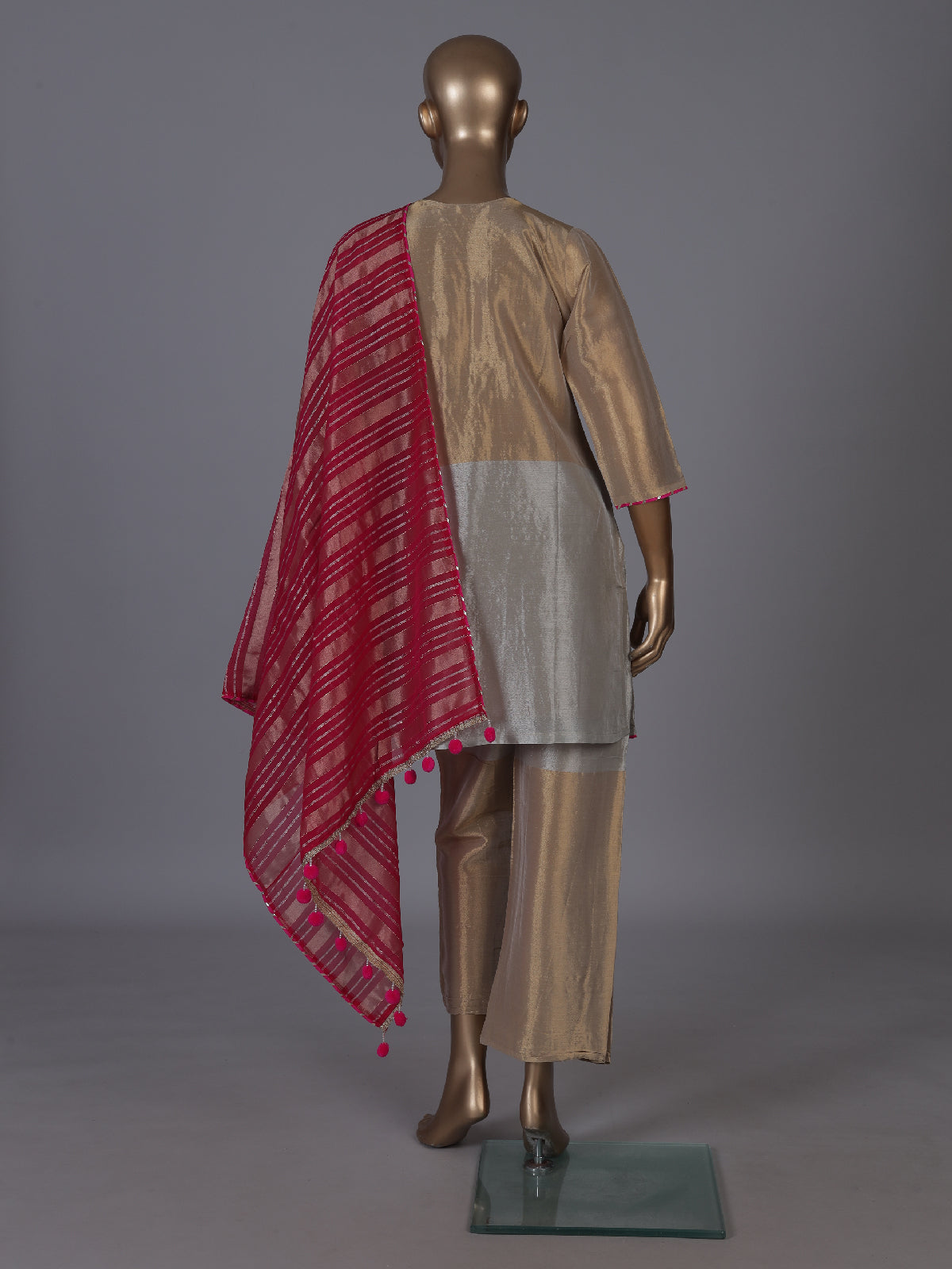Gold and beige silk salwar suit with embroidery
