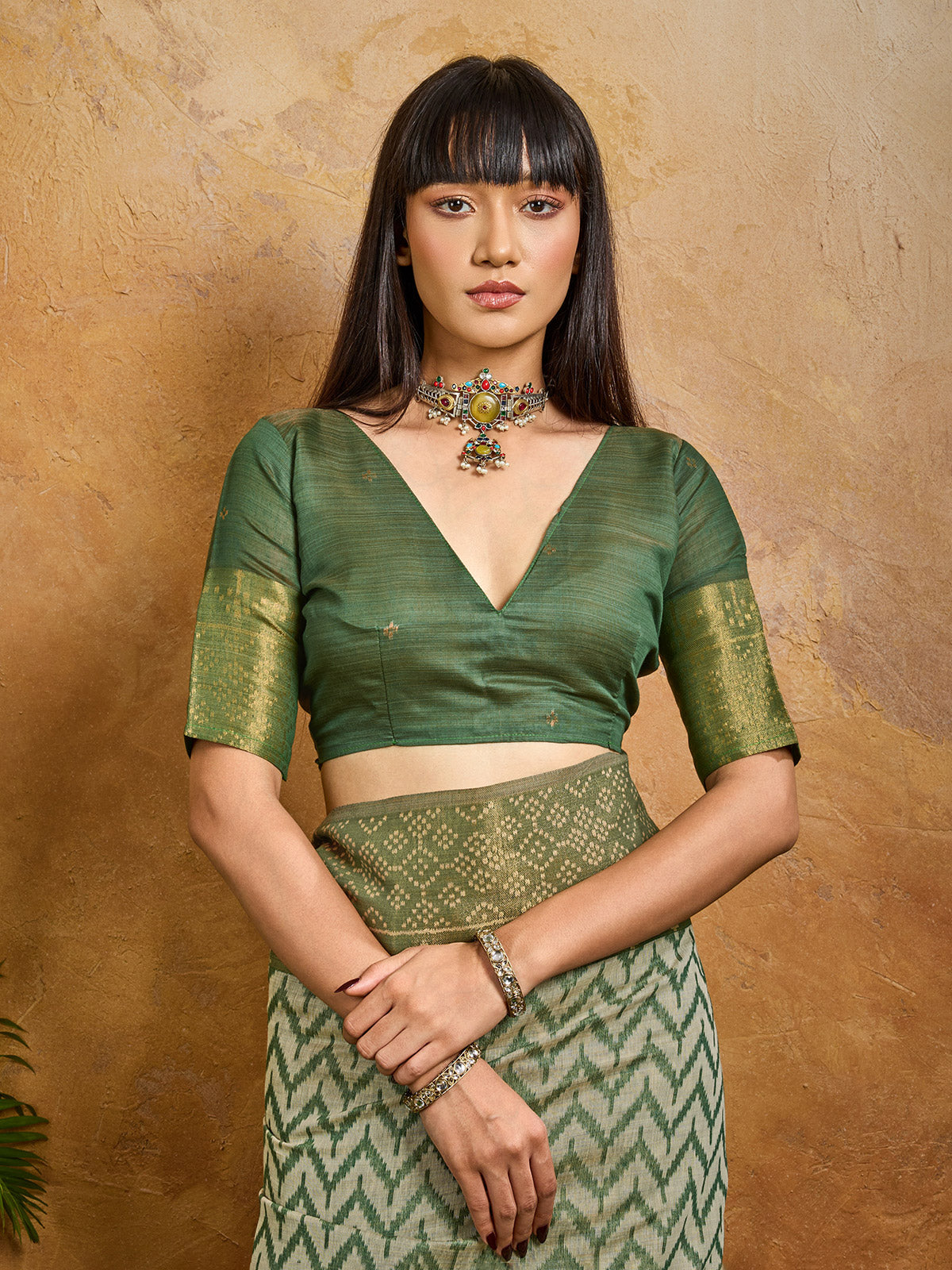 Green vibrant printed zari festive saree elegance