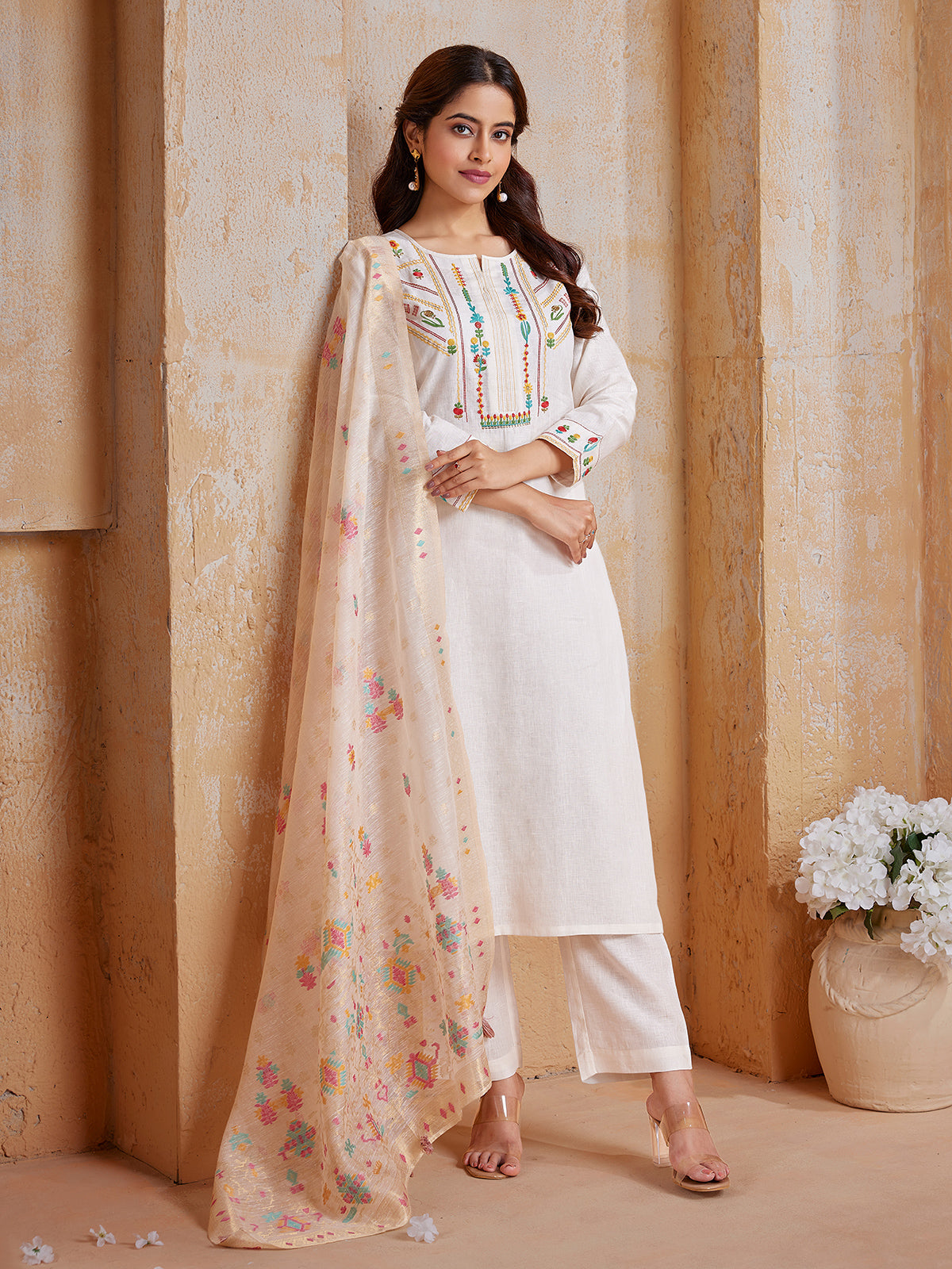 Off white cotton salwar suit with elegant embroidery