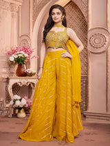 Yellow silk palazzo suit with rich embellish choli