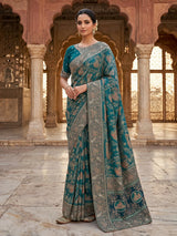 Teal green dola silk saree with royal motifs