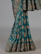Teal green dola silk saree with royal motifs