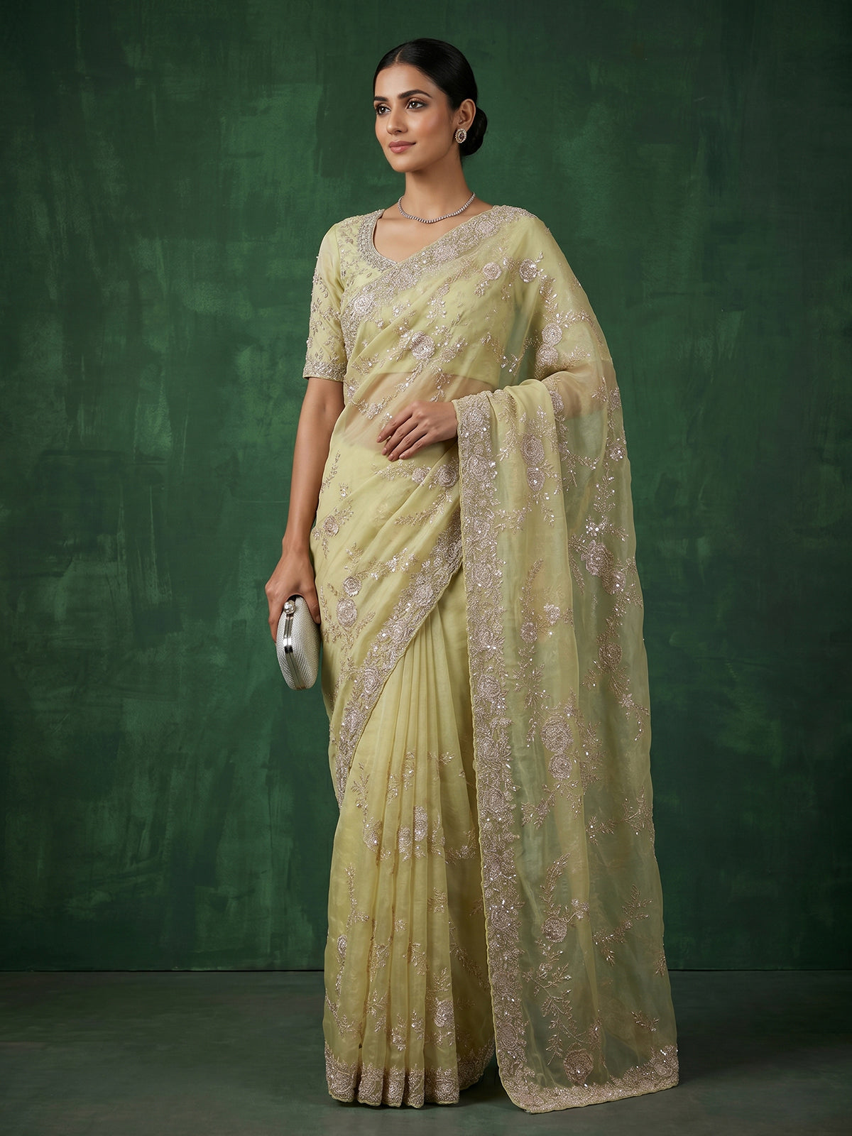 Yellow tissue silk saree with sequins and cutdana work