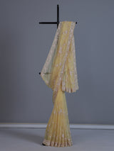 Yellow tissue silk saree with sequins and cutdana work
