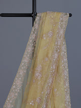 Yellow tissue silk saree with sequins and cutdana work