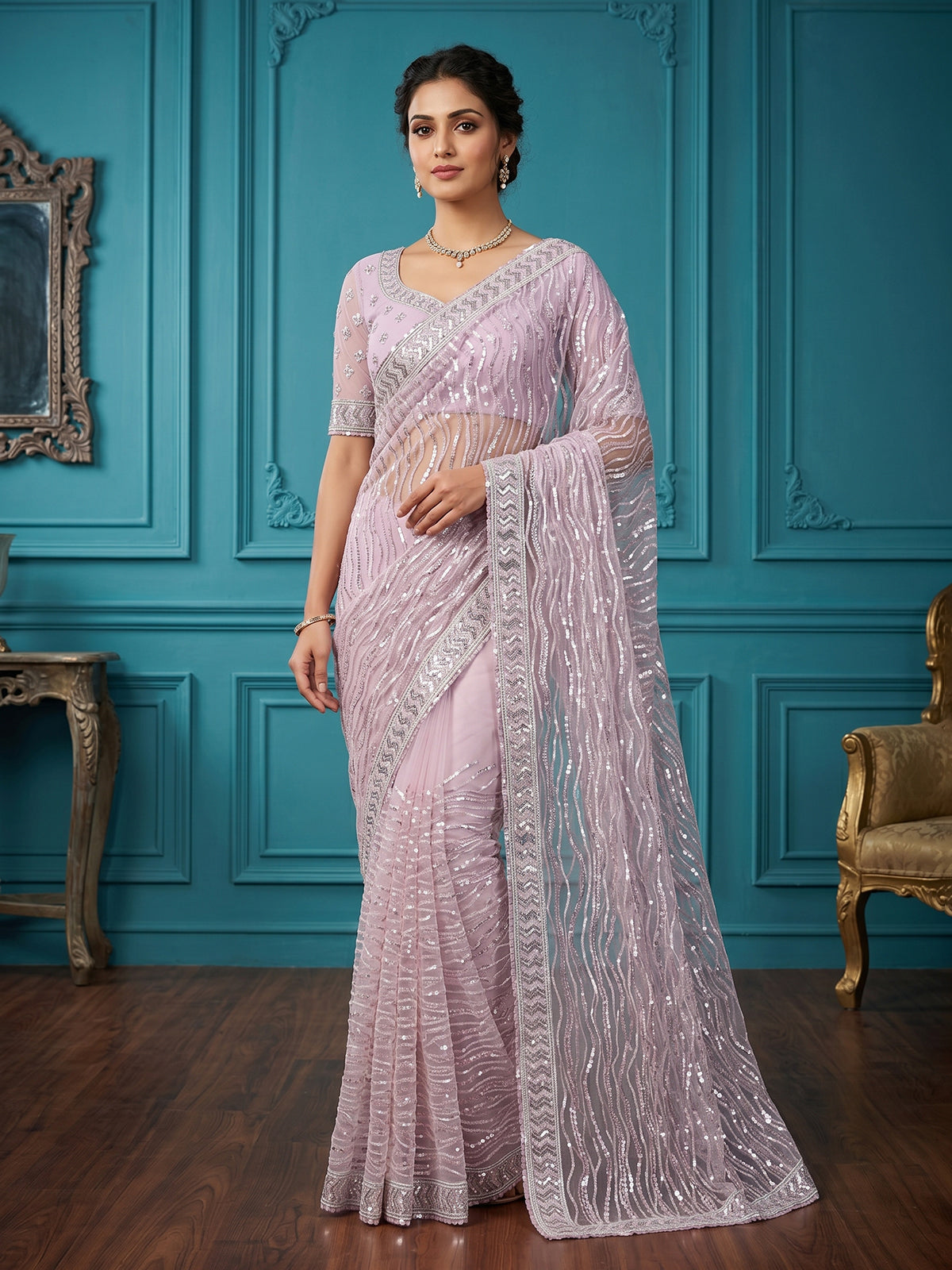 Baby pink party wear net saree with beads and cutdana work