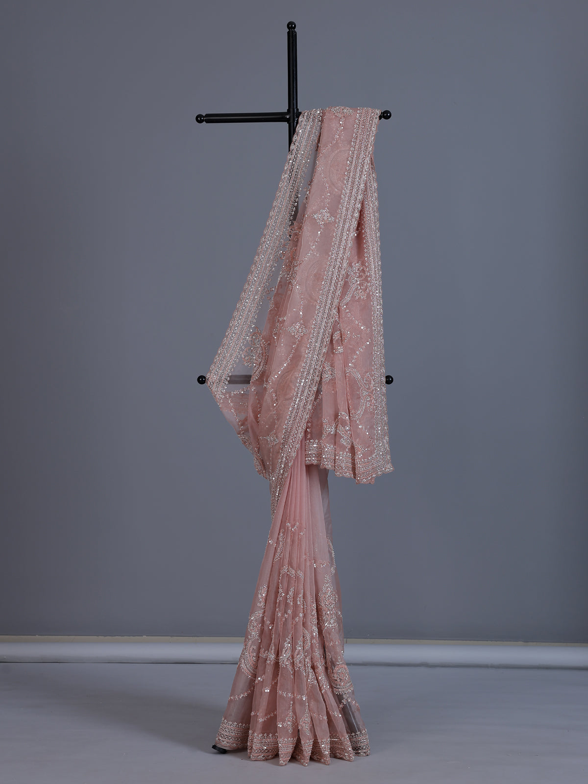 Peach tissue silk saree with beads and cutdana work