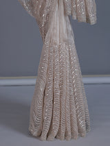 Beige tissue silk wedding wear saree with sequins and cutdana work