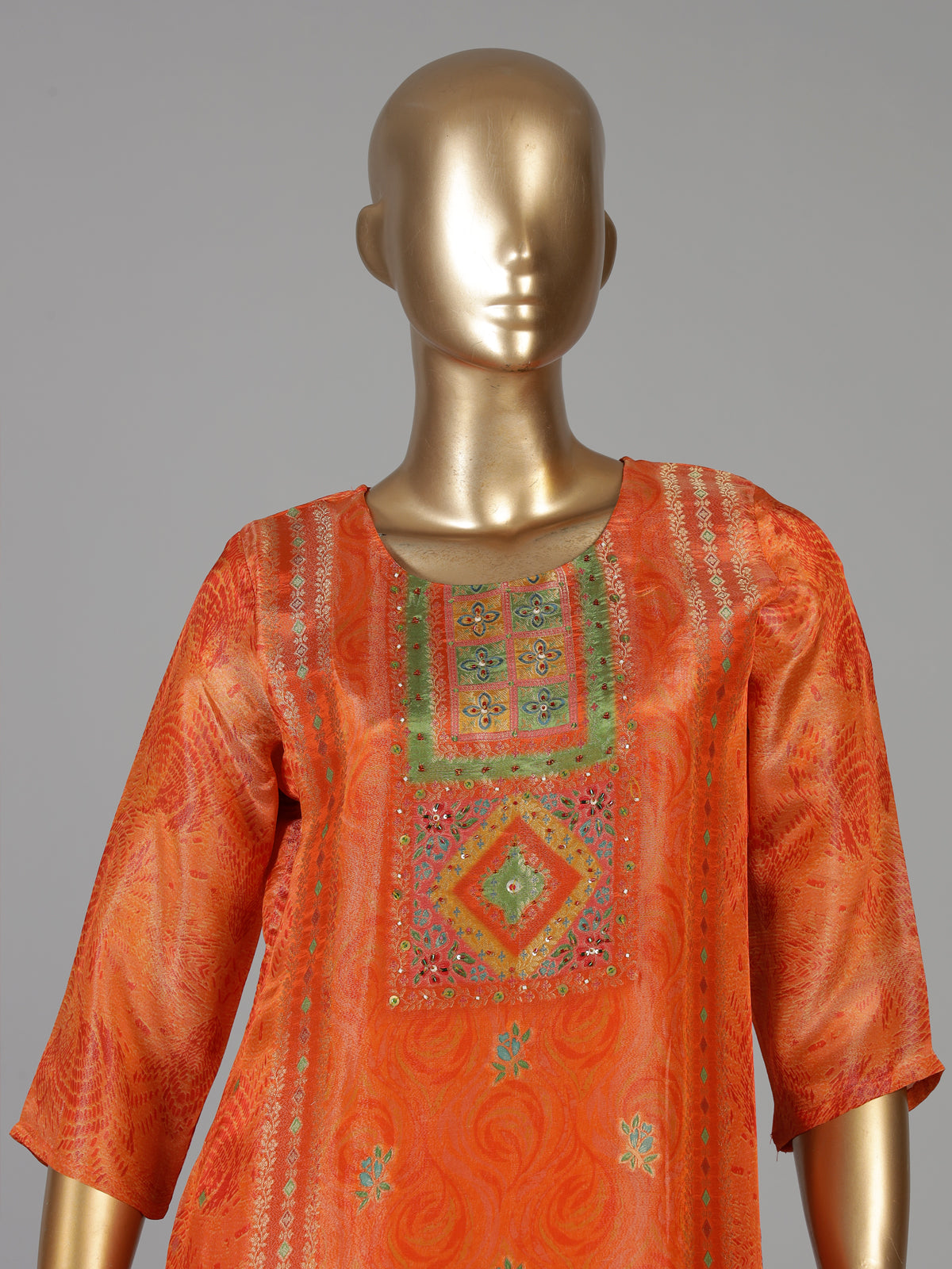 Orange silk festive kurti set with zari embellished neckline